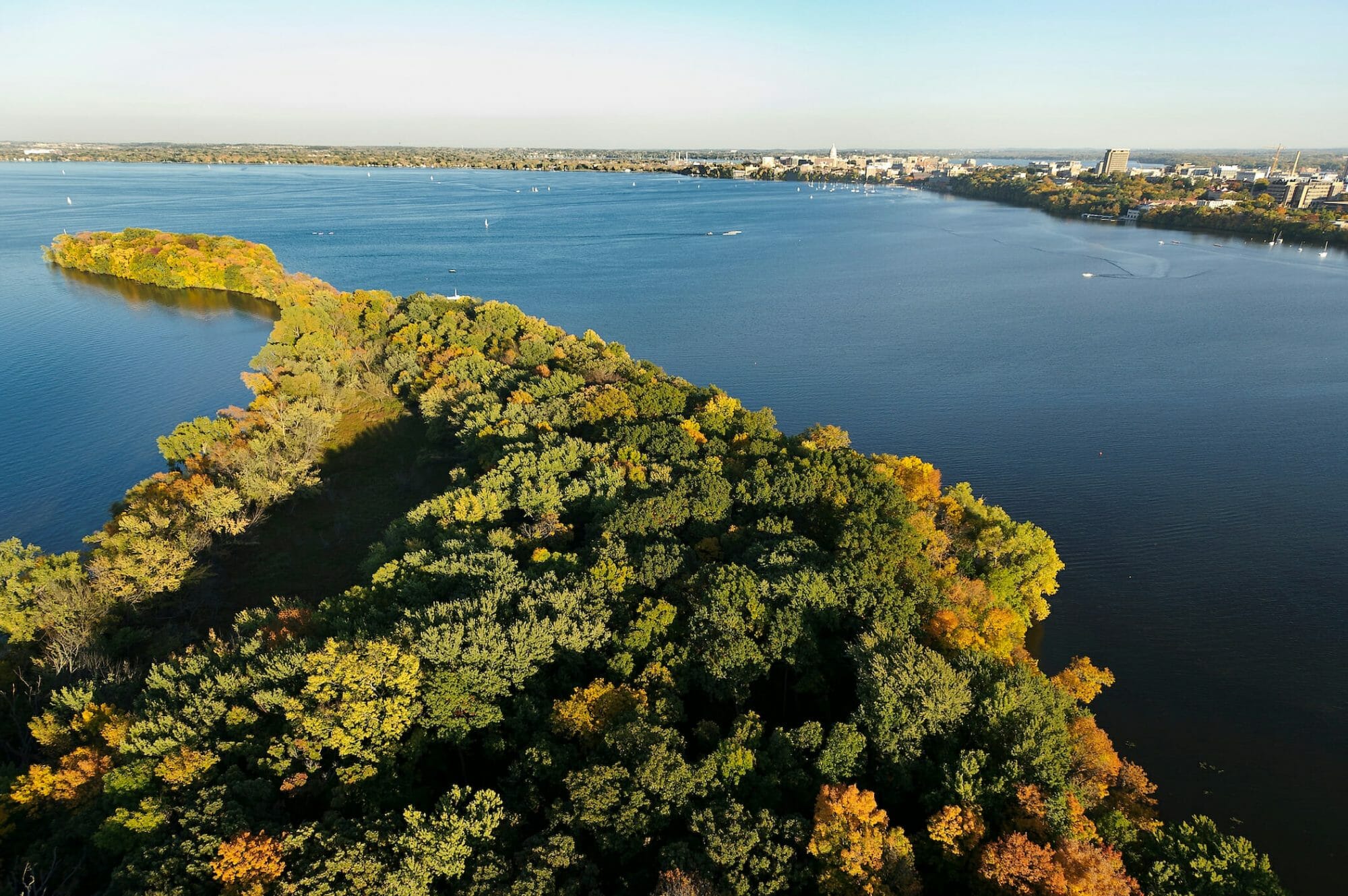 Picnic Point and Lake Mendota are pictured in an aerial view of the University of Wisconsin-Madison campus during an autumn sunset
