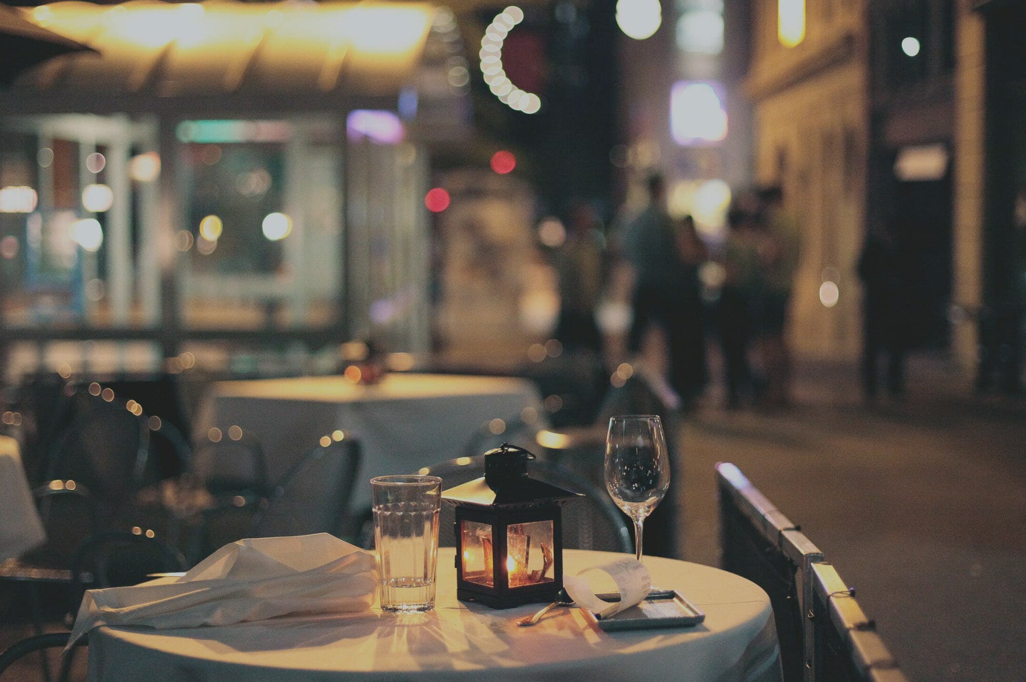 Empty outdoor dining area at night